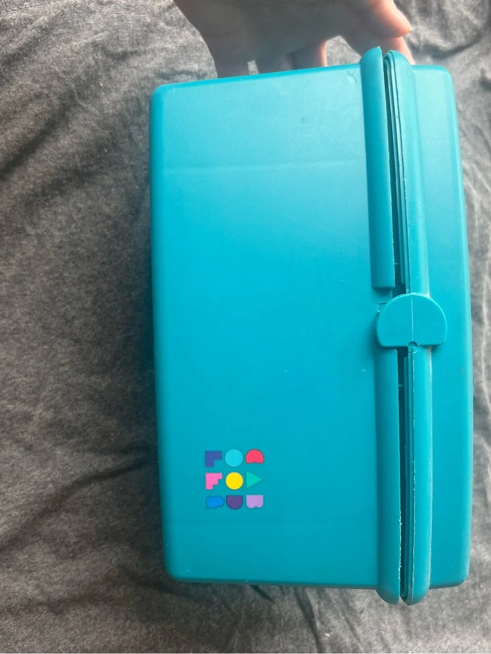 Turquoise Lunchbox with Colorful Logo